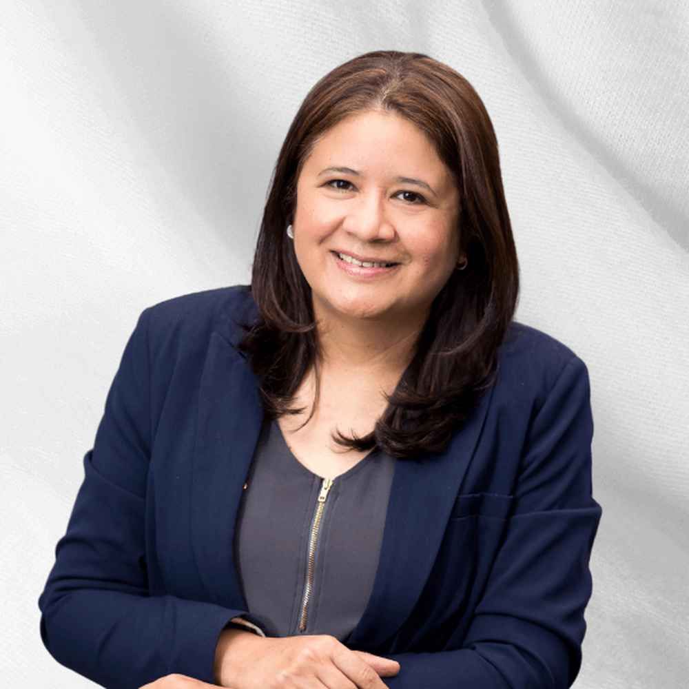 A headshot of Claudia Sandoval, Vice-President of Global Social Compliance and Environmental Affairs