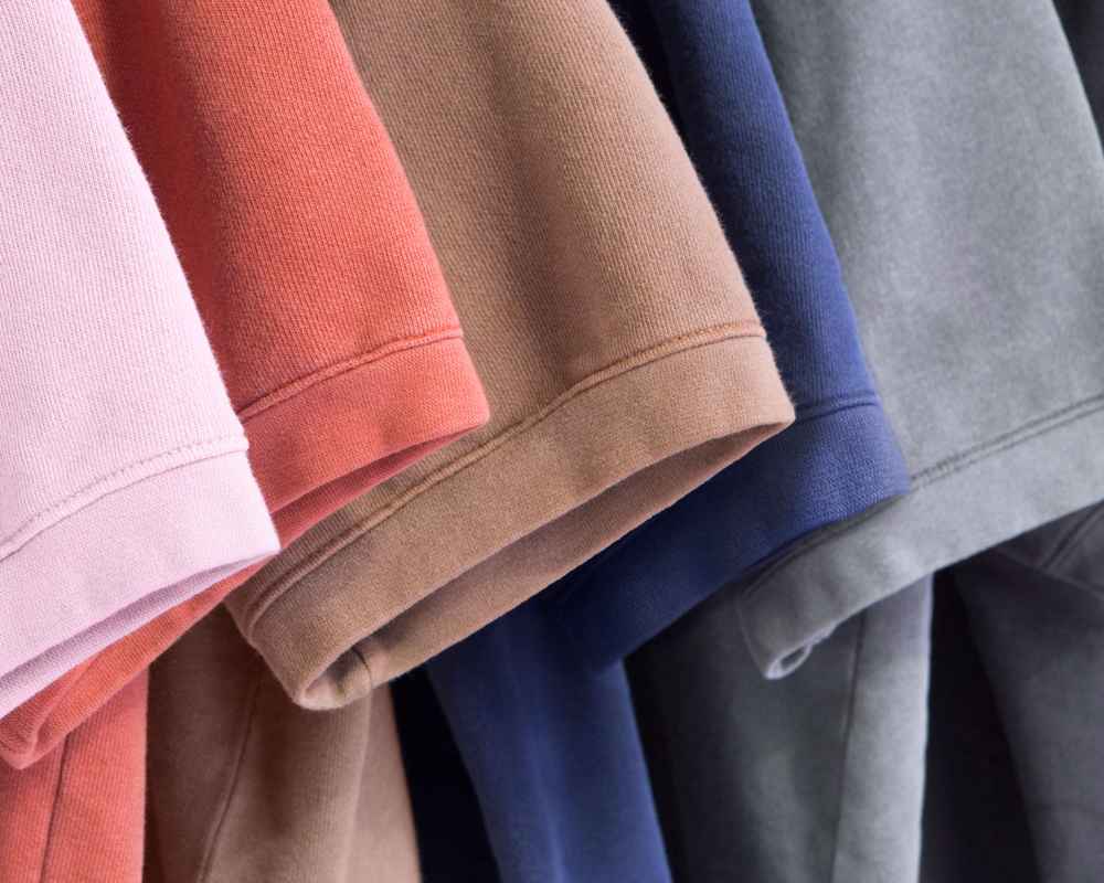 A close-up of various colored American Apparel™ t-shirt sleeves.