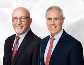 Michael Kneeland, Presidente del Consejo de Administración de Gildan, y Glenn J. Chamandy, President