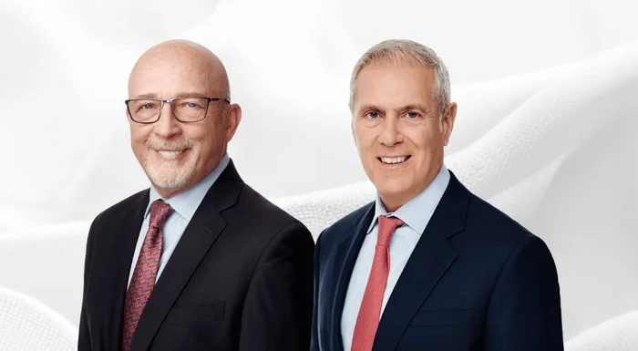 Michael Kneeland, président du conseil d'administration, et Glenn Chamandy, président-directeur