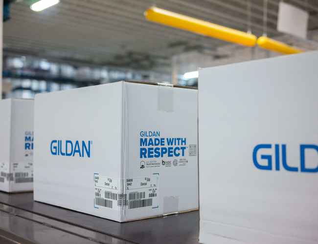 An assembly line of Gildan boxes in the Distribution Center in Charleston.