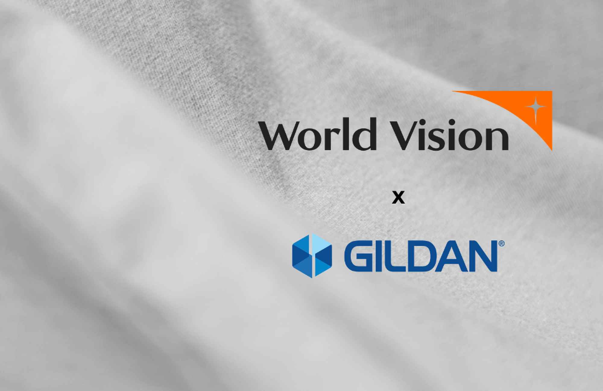 Gildan and World Vision logos against a grey fabric background